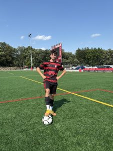 Alejandro from Spain participating in boys varsity soccer.